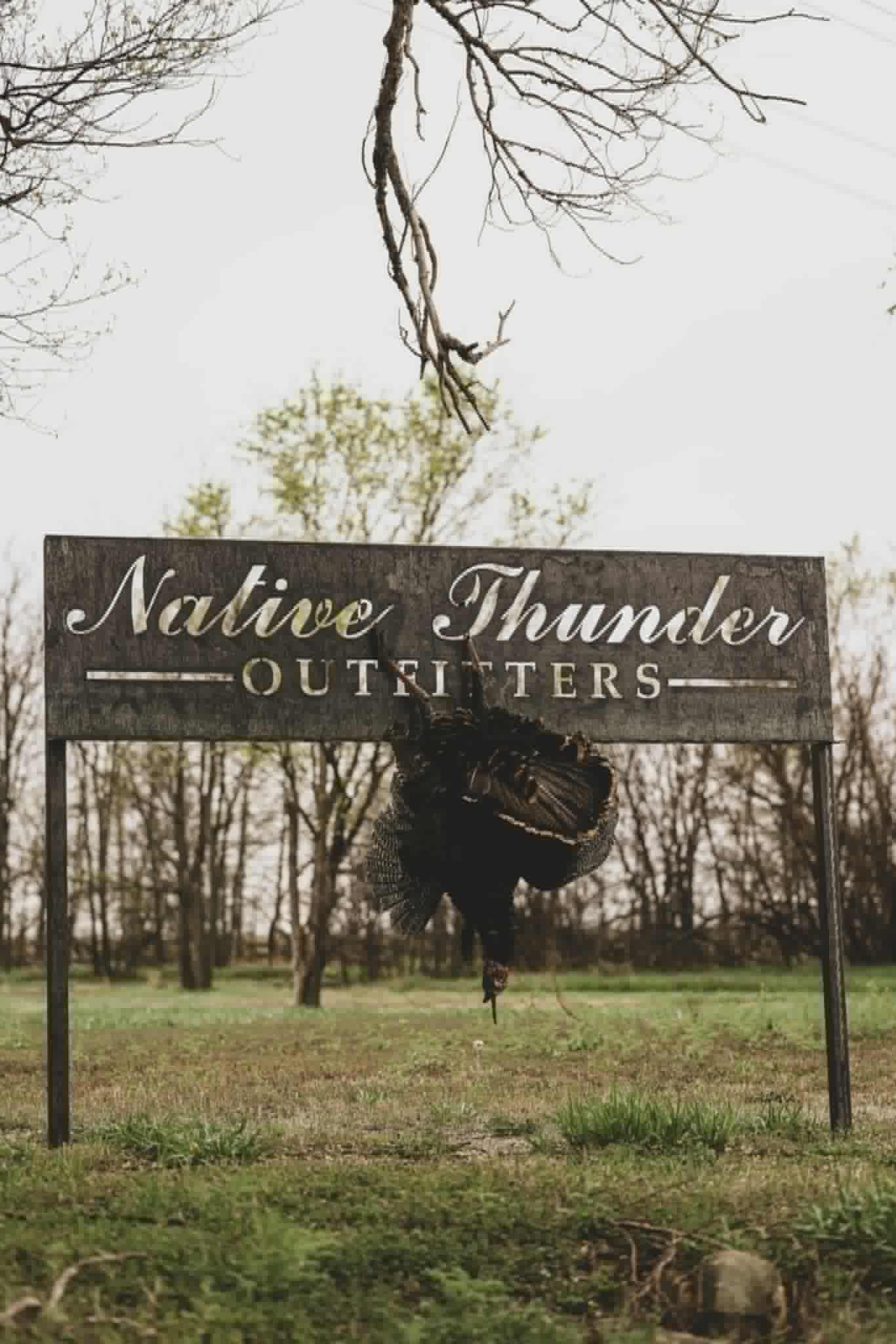 Native Thunder Outfitters sign with a tom