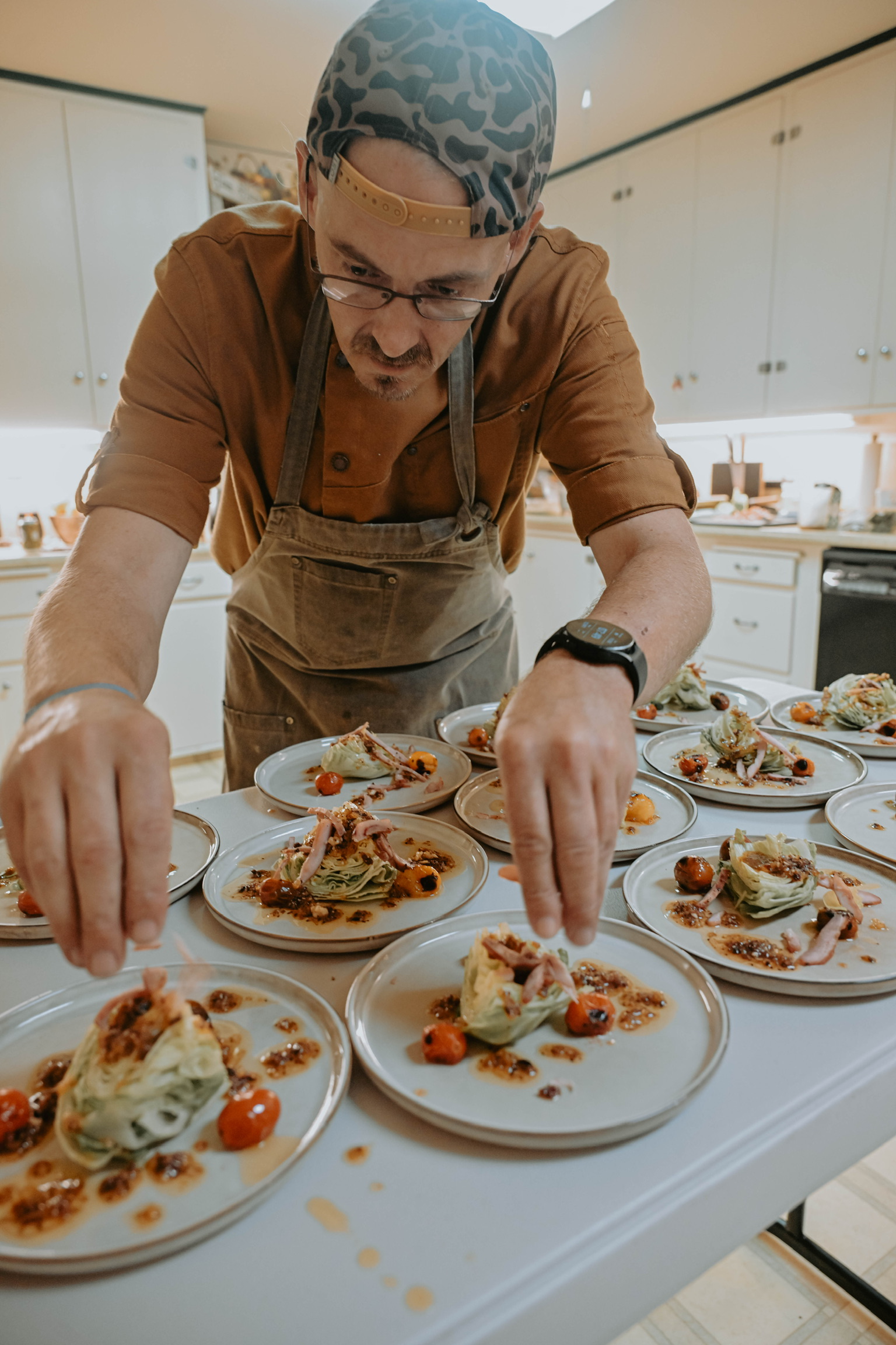 Chef plating dinner